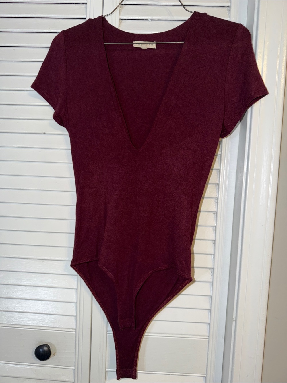 Plunging V Short Sleeve Bodysuit in Wine